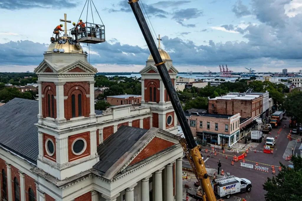Illustration for the news story: Crews Scale 160 Feet to Fix Mobile Cathedral Lights After Lightning Damage