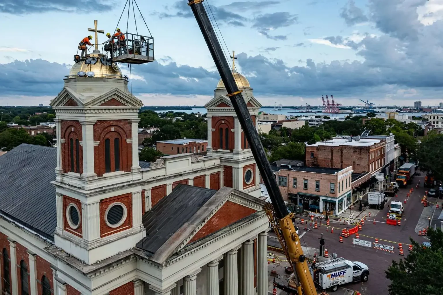 Illustration for the news story: Crews Scale 160 Feet to Fix Mobile Cathedral Lights After Lightning Damage