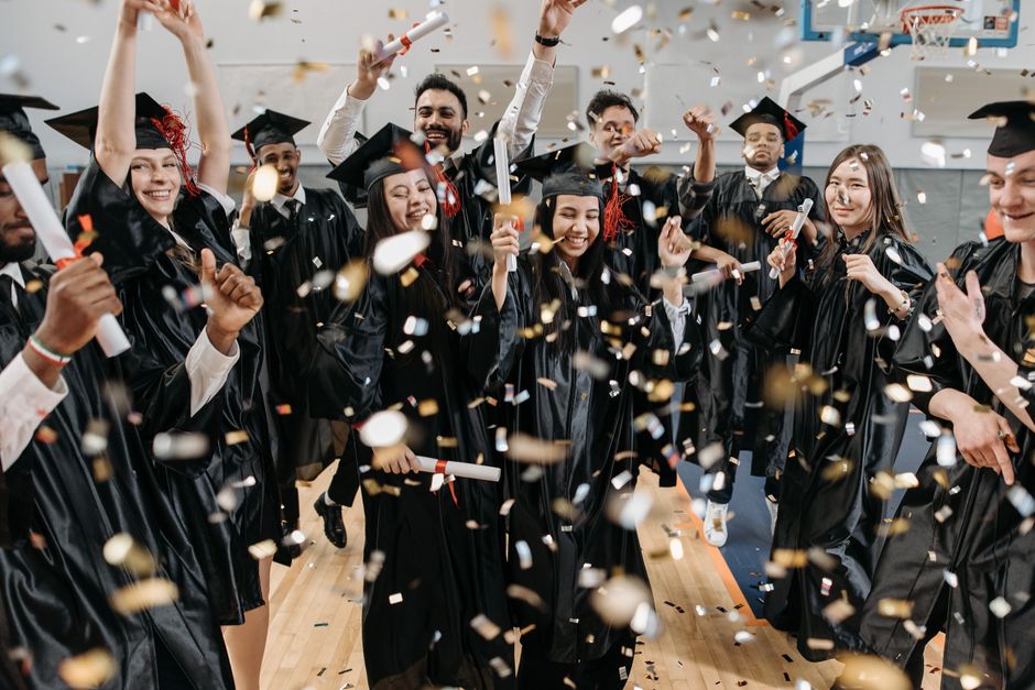 High school students celebrating graduation and academic honors
