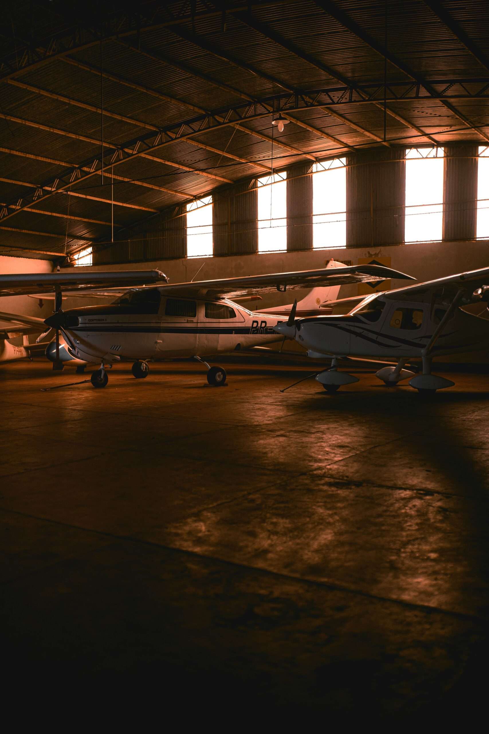 Aircraft inside a large aerospace hangar, representative of the Airbus and Boeing tanker competition tied to Mobile's Brookley Aeroplex
