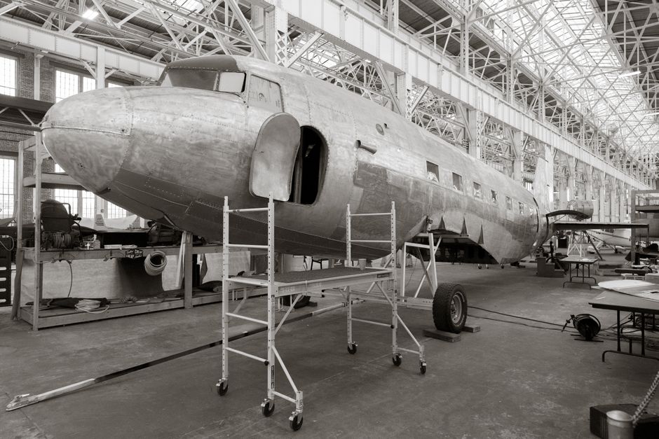 Interior of a large aircraft assembly hangar under construction