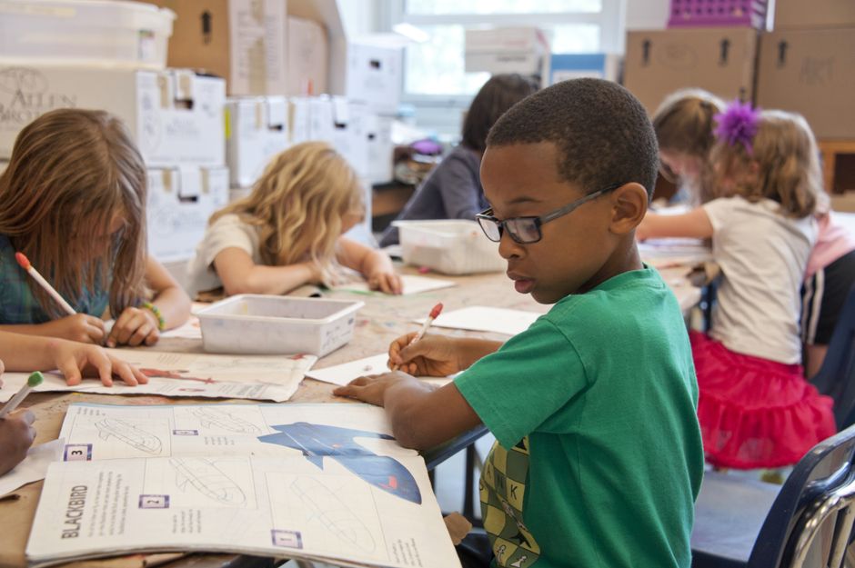 Students reading in a classroom