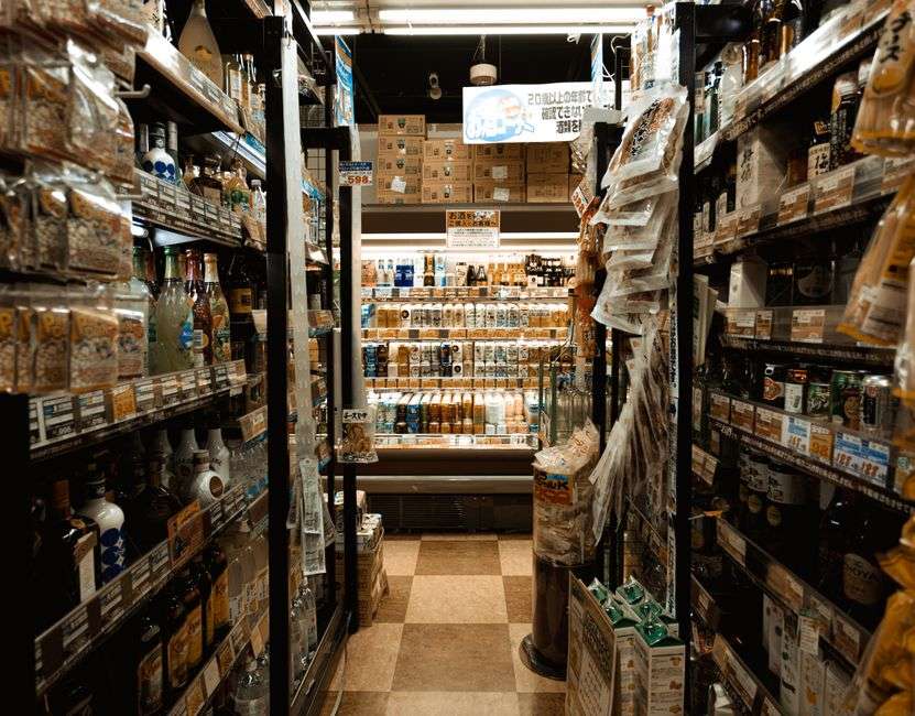 Shelves of packaged goods inside a convenience store, similar to those where kratom products were once sold in Alabama