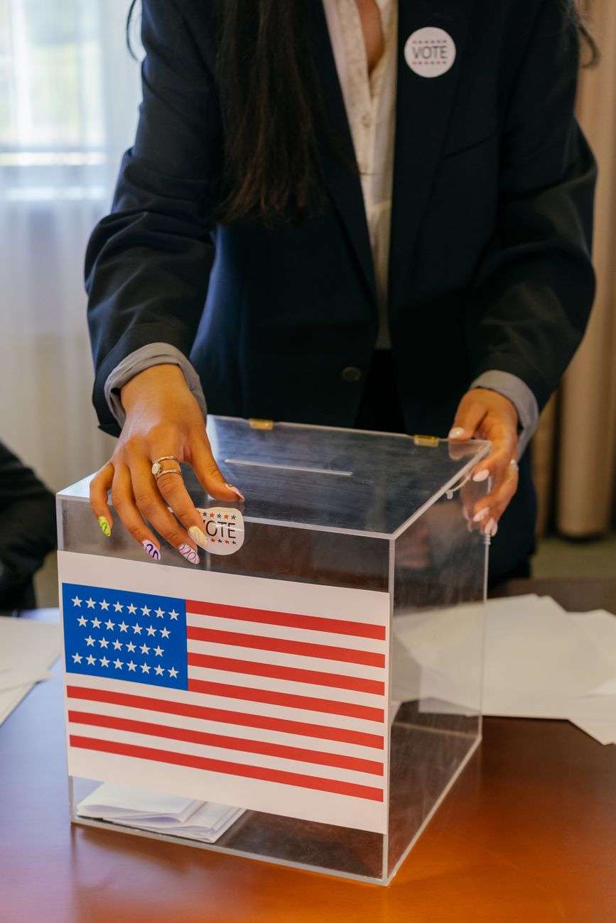 A voter places a ballot into a box during a special election