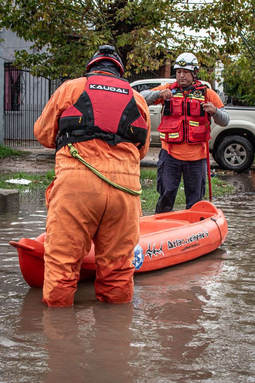 Swift water rescue crew working in flooded conditions