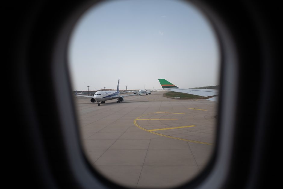 An airport terminal representing air travel and tourism