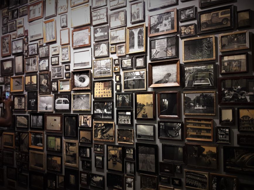 Historical artifacts and paintings on display at a Mobile art museum