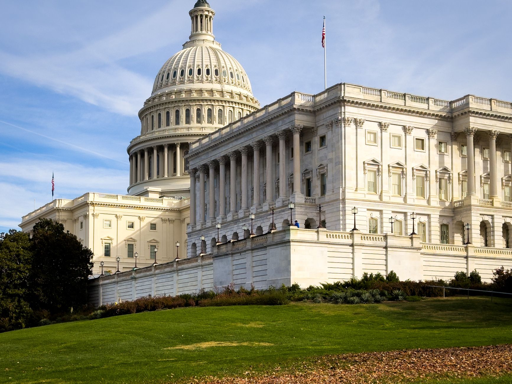 The United States Capitol dome under a clear sky