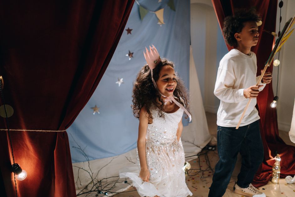 Students rehearsing a theater production in a high school setting