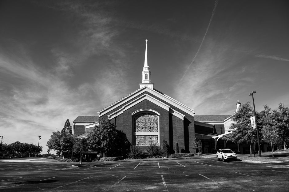 A historic wooden church building at a county park