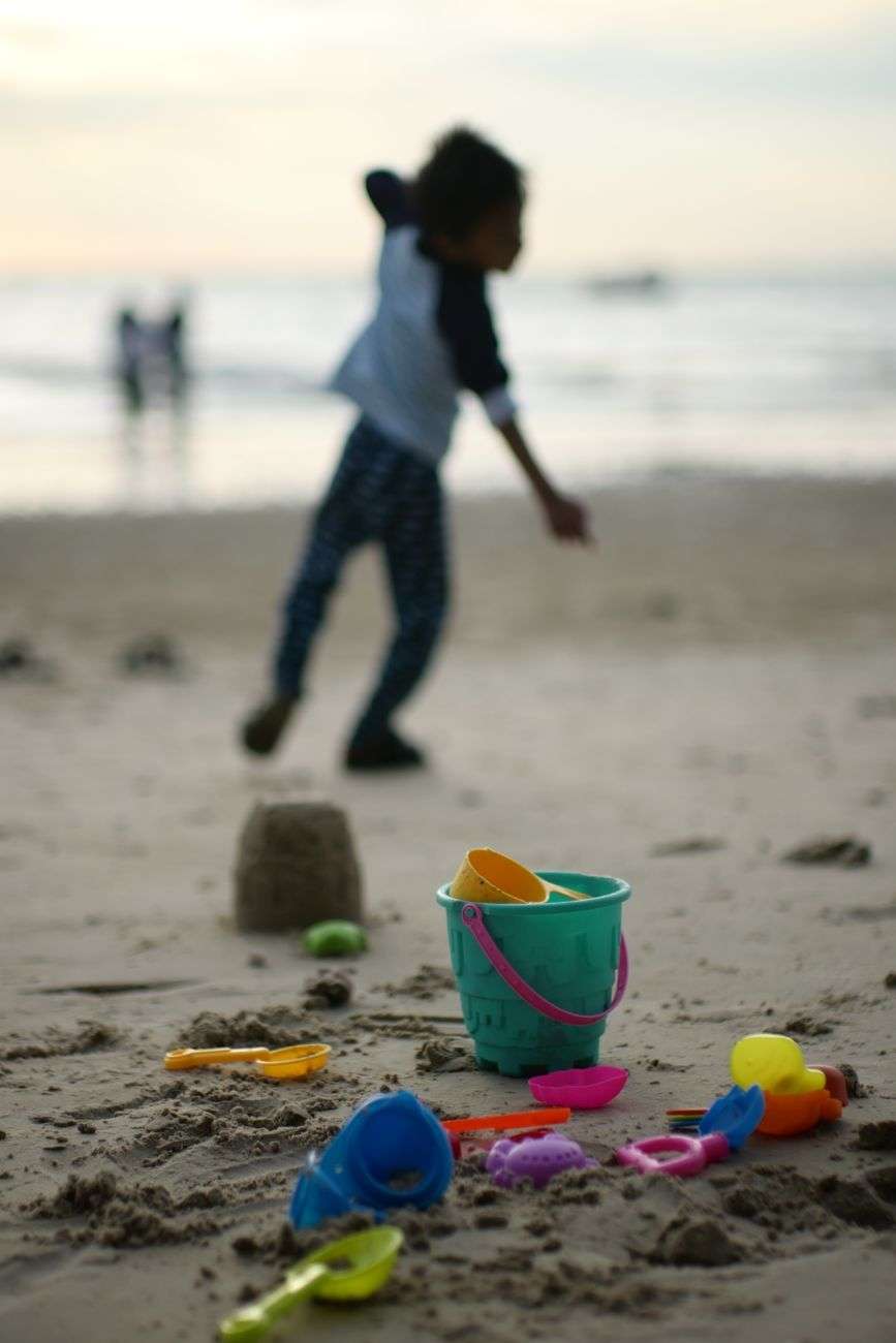 Children playing outdoors during a summer family activity