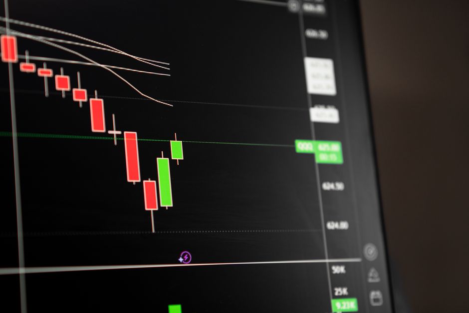 A stock market chart showing a sharp decline on a trading screen