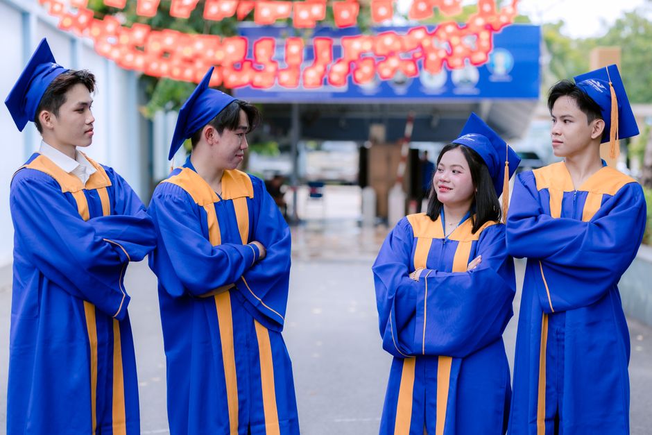 High school students celebrating academic achievement
