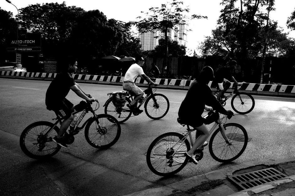 Cyclists commuting downtown representing Bike to Work Day