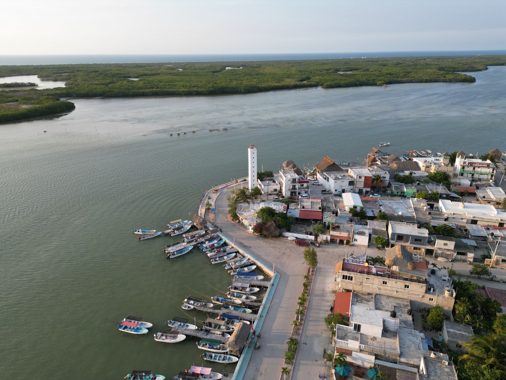 Fishing boats docked at a Gulf Coast harbor at dusk
