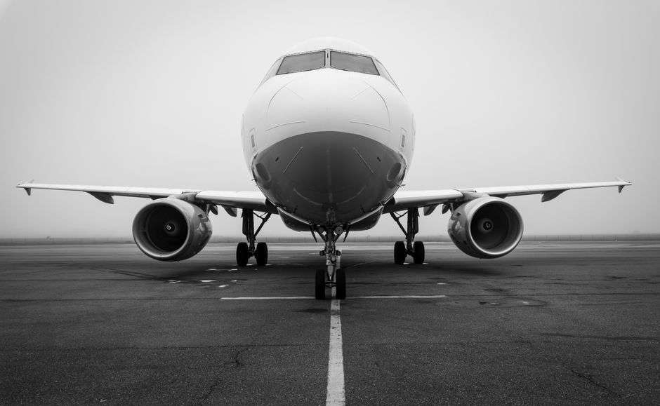 A commercial jet aircraft sits on an airport tarmac, representing the type of aircraft assembled at Mobile's Airbus facility