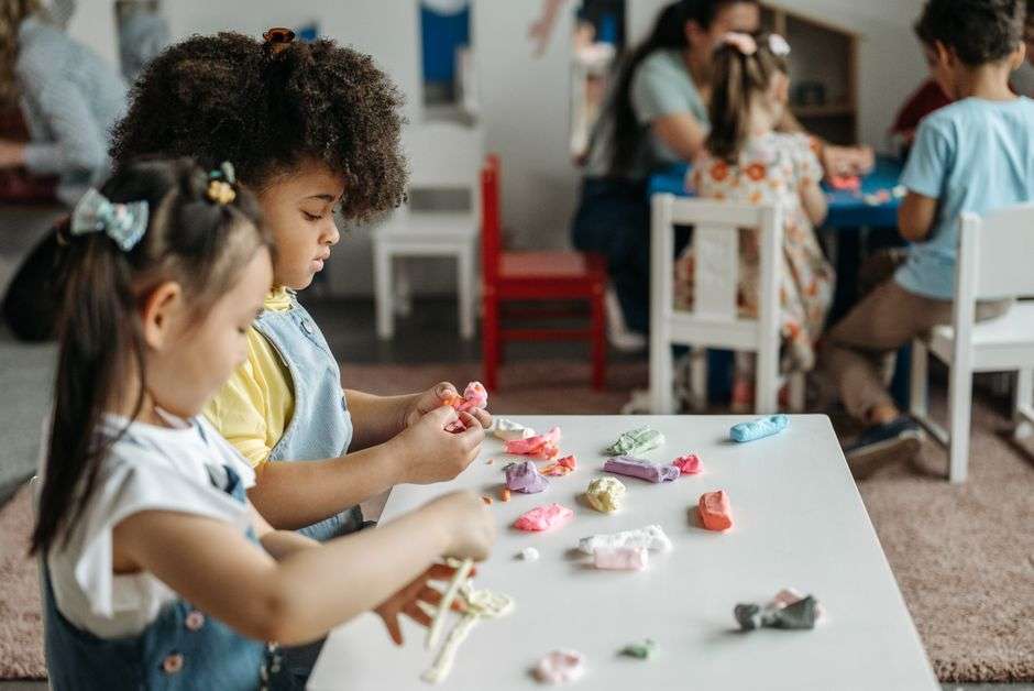 Young children participating in a preschool classroom activity