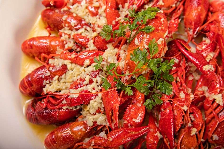 A Cajun-style crawfish boil with seasoned potatoes, corn and garlic butter