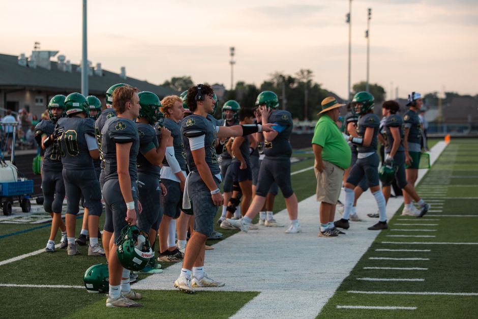 A football coach on the sideline during practice