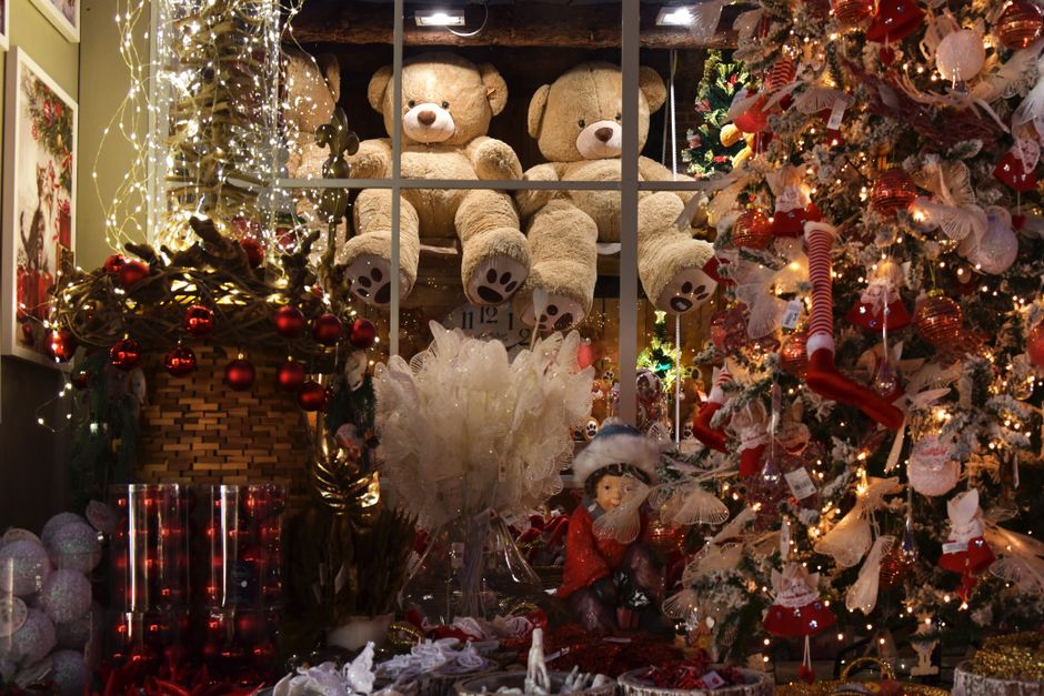 Christmas ornaments and decorations displayed inside a specialty holiday store
