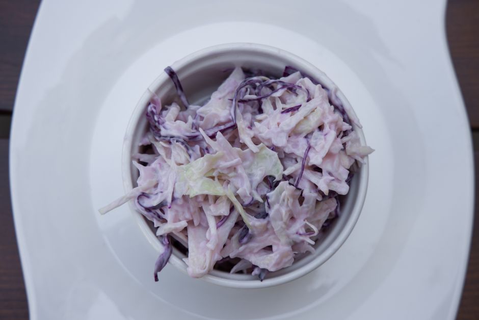A bowl of fresh coleslaw similar to the Cock of the Walk recipe now sold in local stores