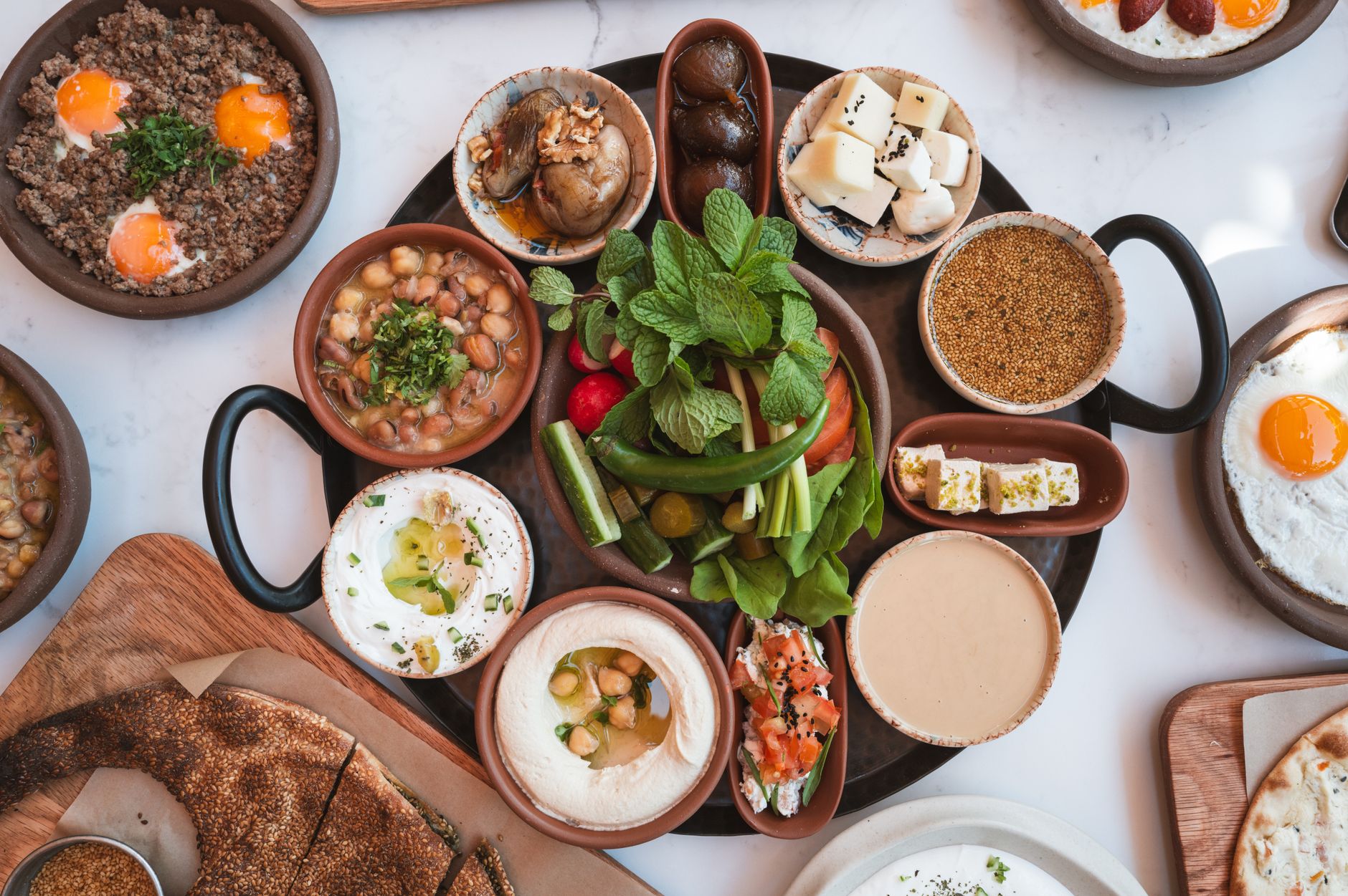 Spread of Lebanese and Mediterranean dishes on a table