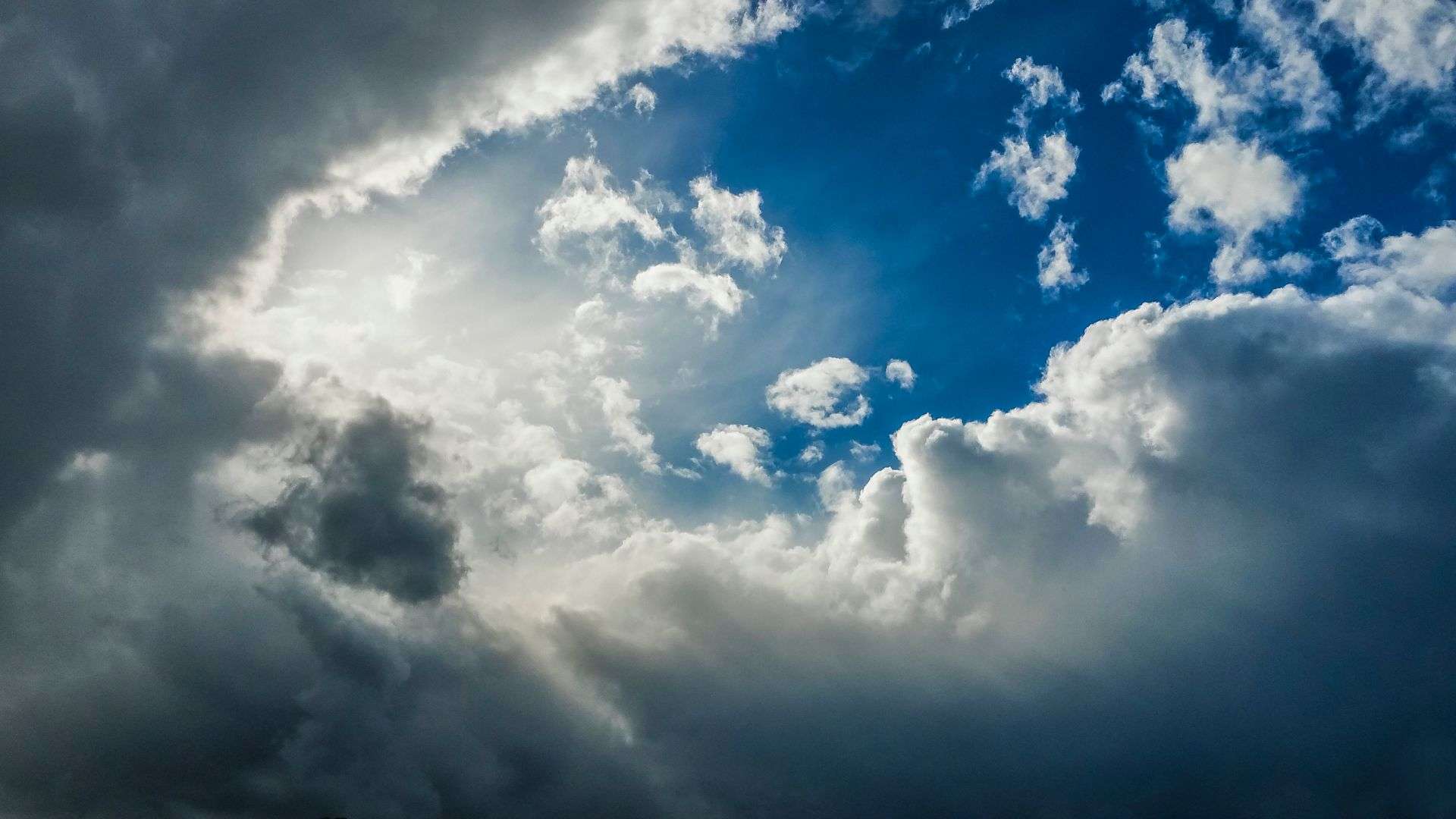 Clouds breaking apart over South Alabama as the weather pattern shifts toward relief from the heat wave