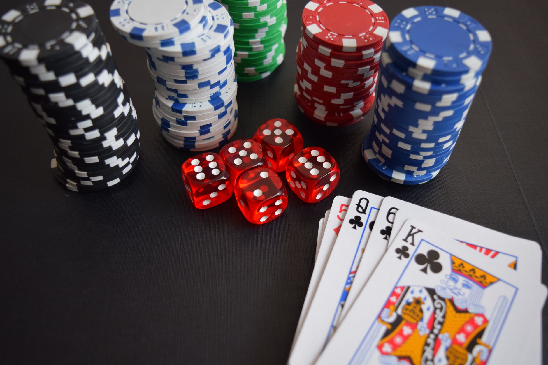 Casino chips and cards on a gaming table, representing the debate over legal gambling in Alabama