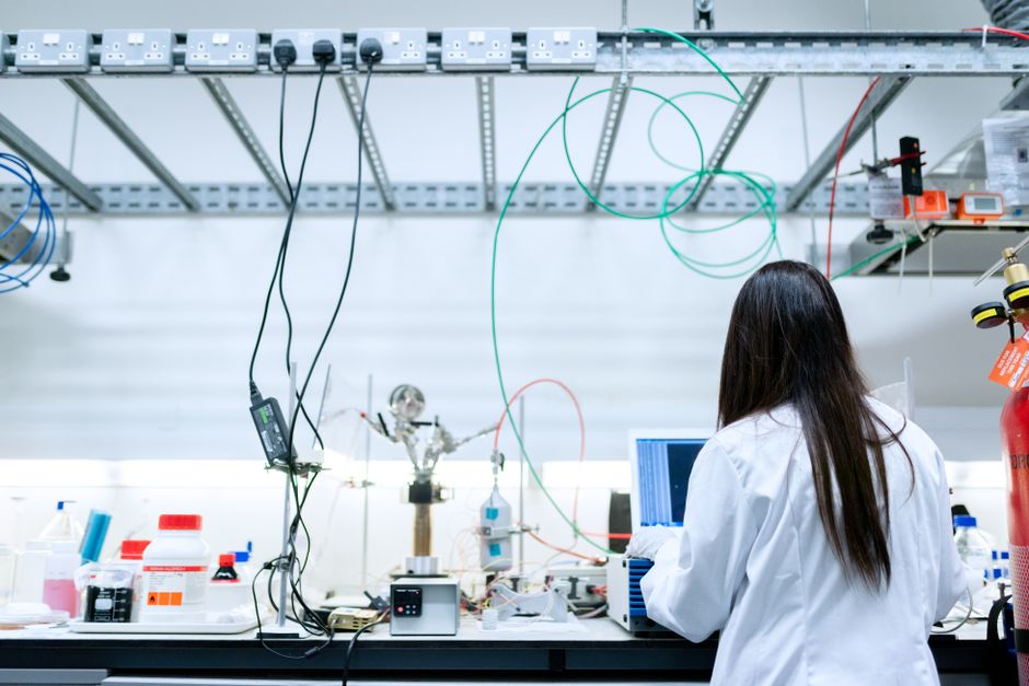A female engineer at work in a research laboratory, representing Daphne native Elizabeth Hayes's career