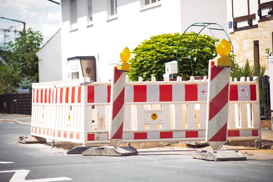Construction barriers blocking a road intersection during roadwork