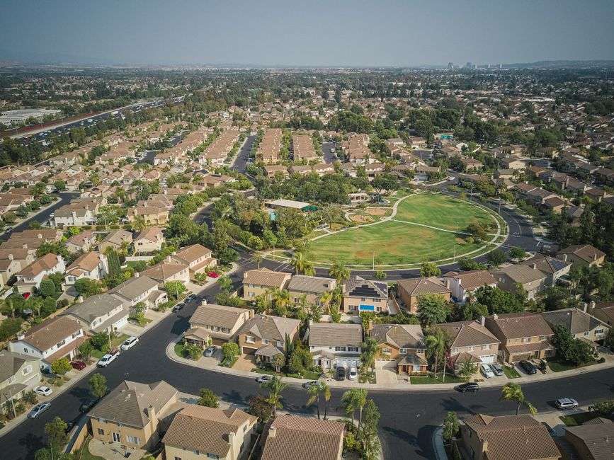 Aerial view of a suburban neighborhood with streets and rooftops similar to those being considered for annexation into Mobile