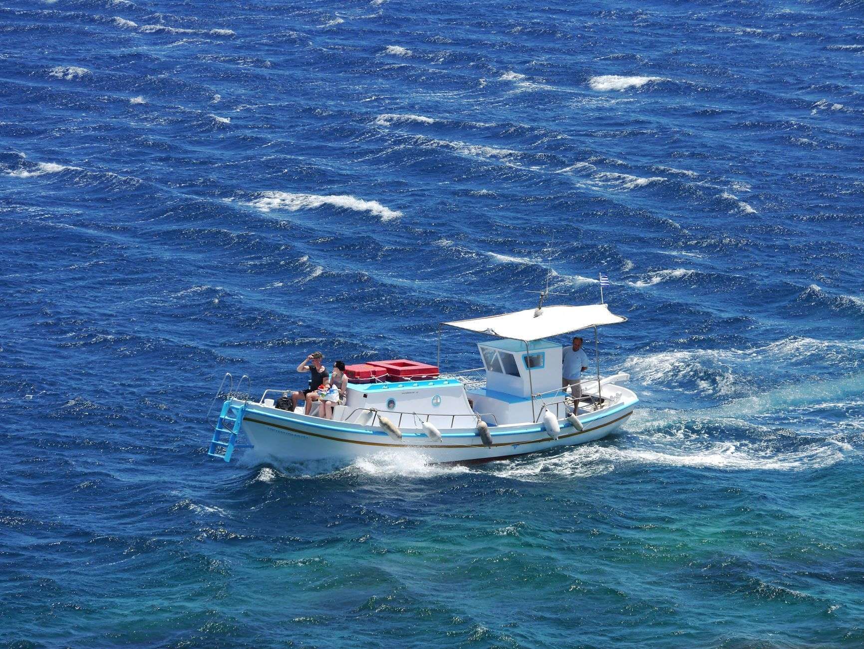 Fishing boats on the water during the Alabama Deep Sea Fishing Rodeo on Dauphin Island