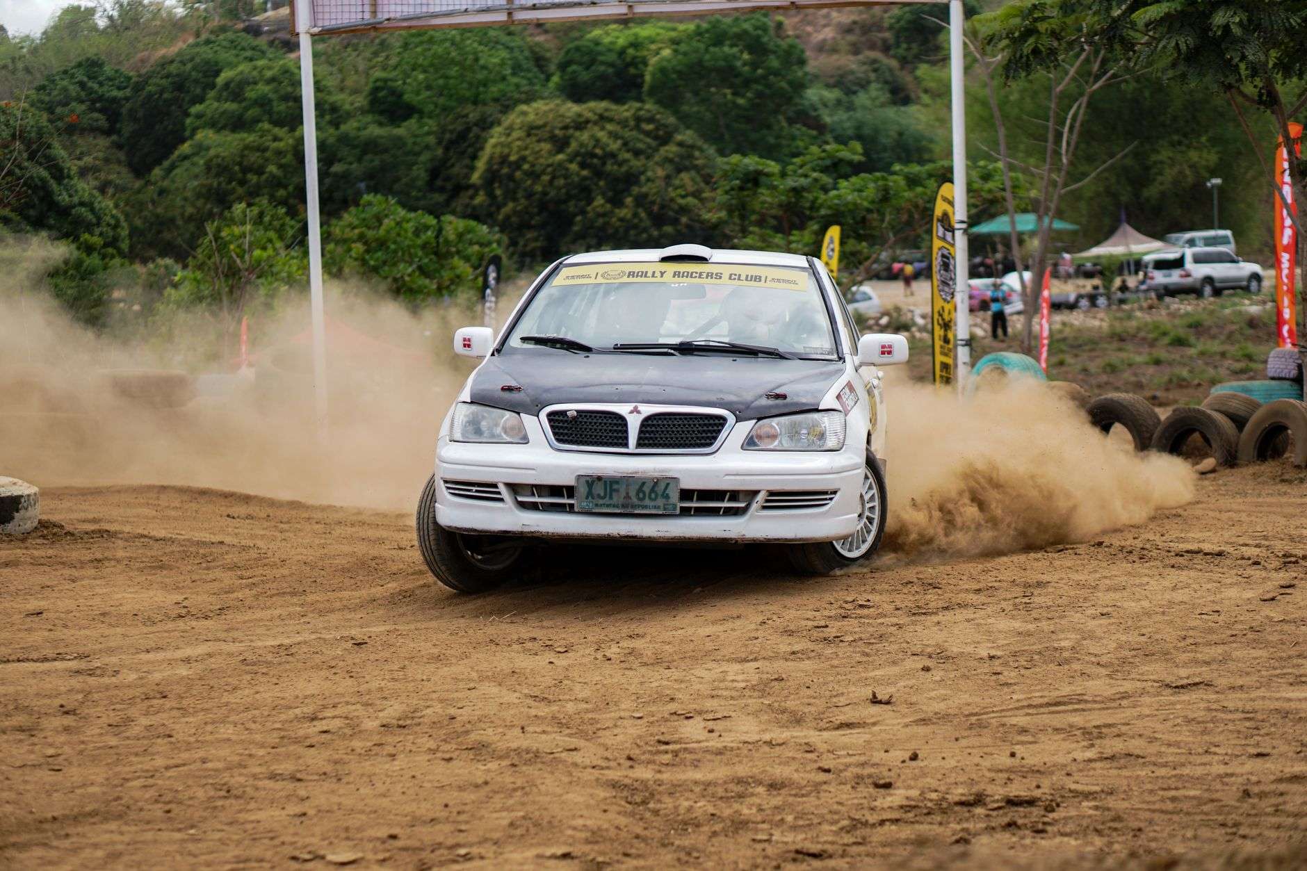 Race cars on a dirt track