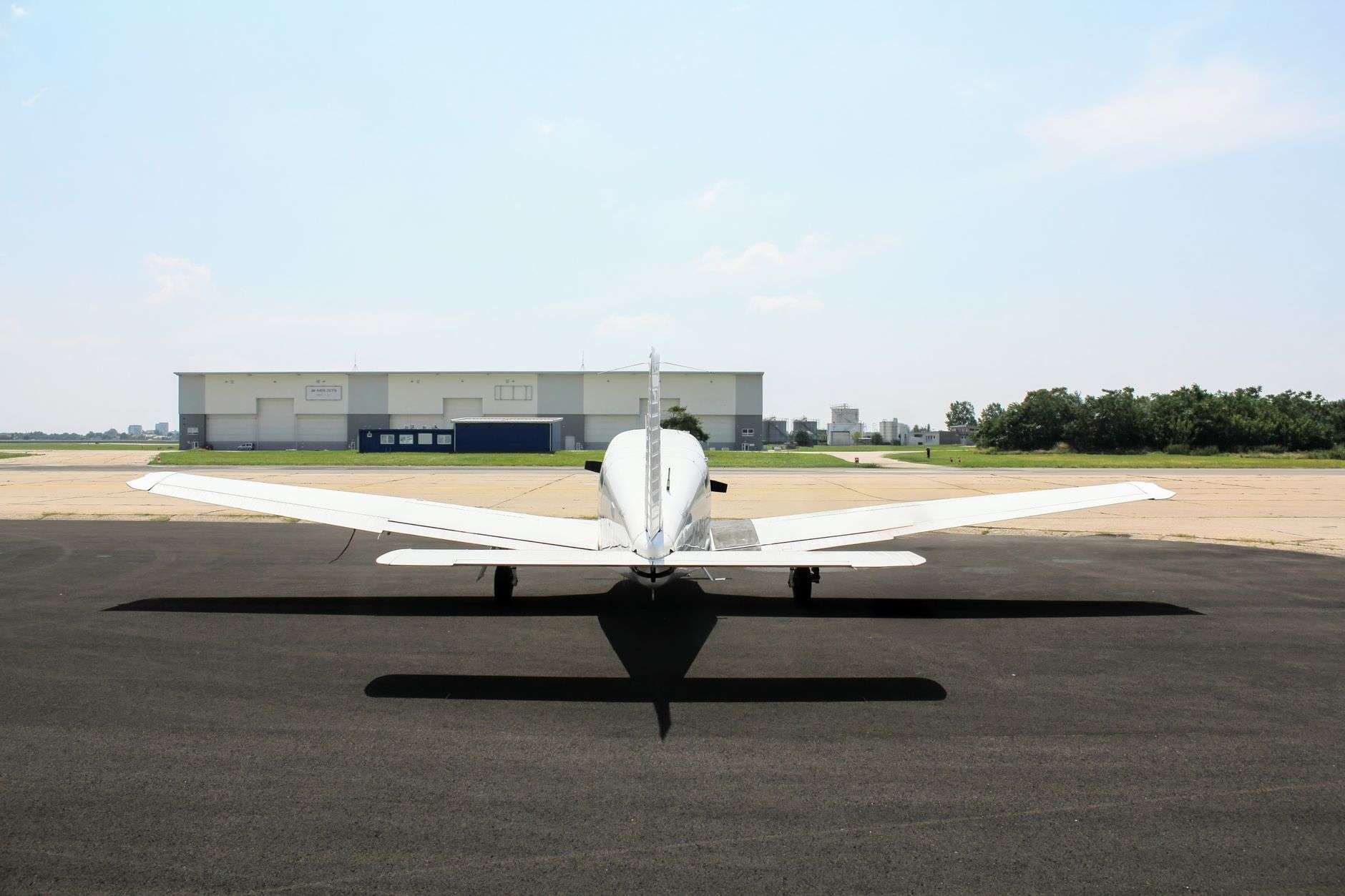 Small municipal airport runway and hangar