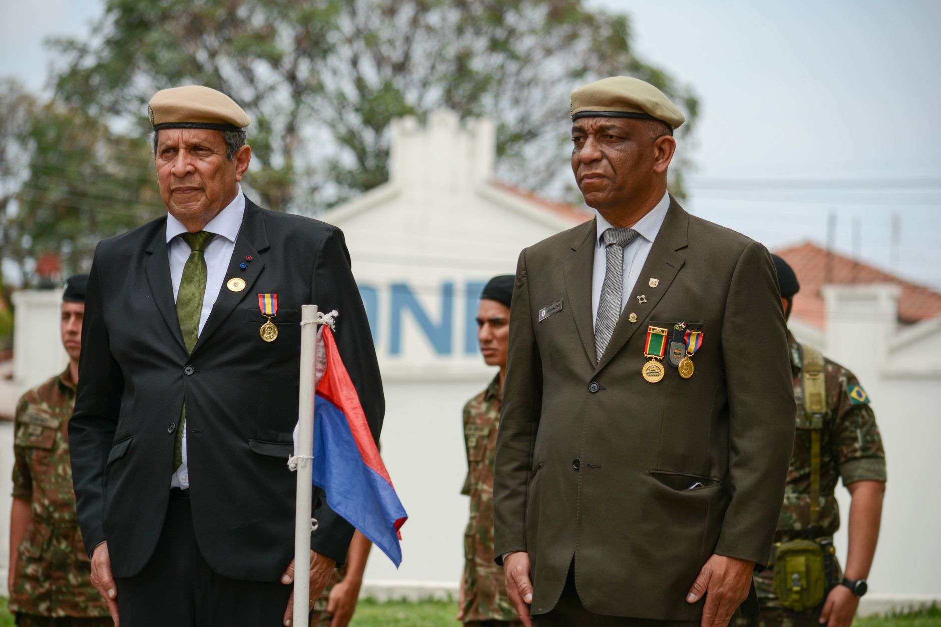 Military medal and American flag representing a veterans honor ceremony