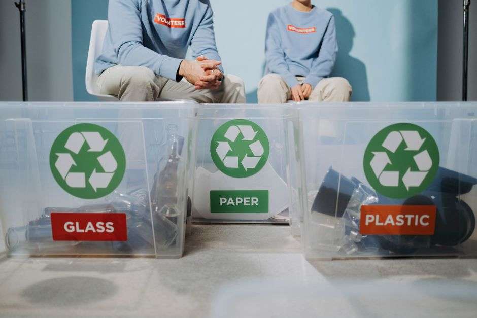 Volunteers sort recyclable materials during a community recycling effort