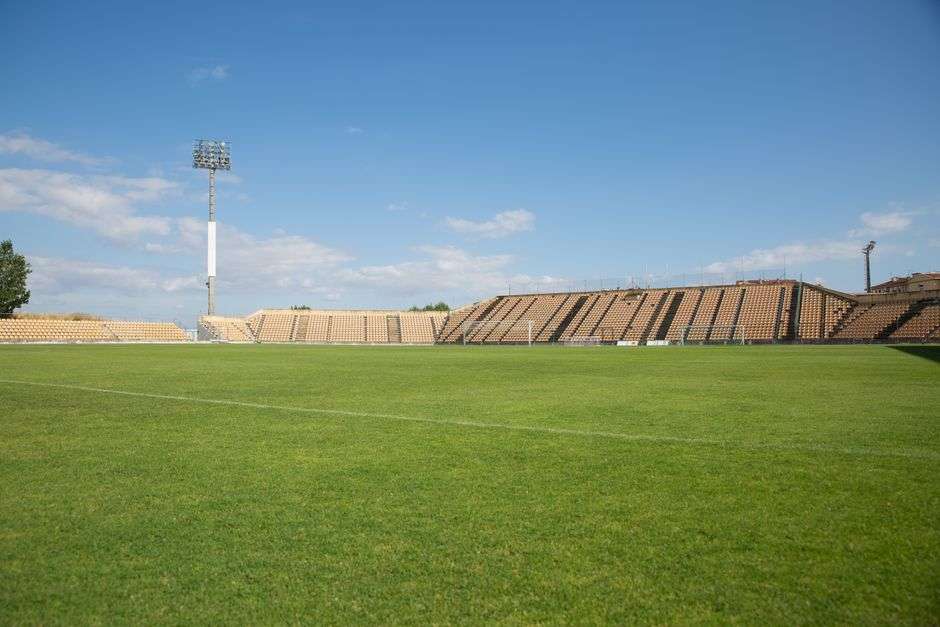 Empty soccer stadium with no players on the field
