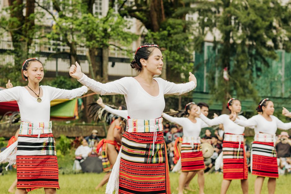 Visitors walking through an outdoor arts festival
