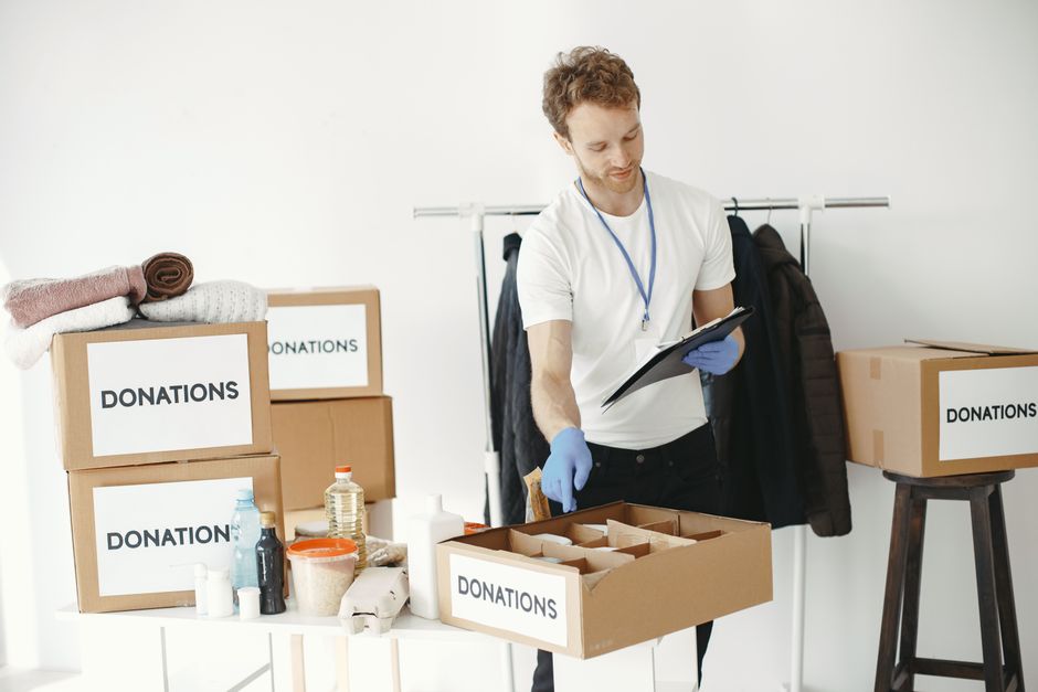 Volunteers helping a family at a community shelter