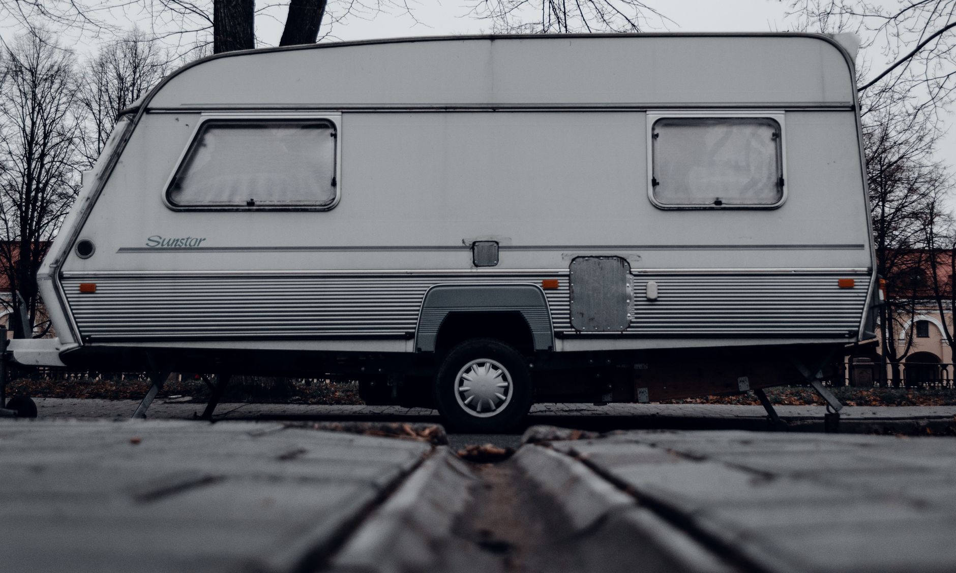 Rows of travel trailers parked at a temporary housing site