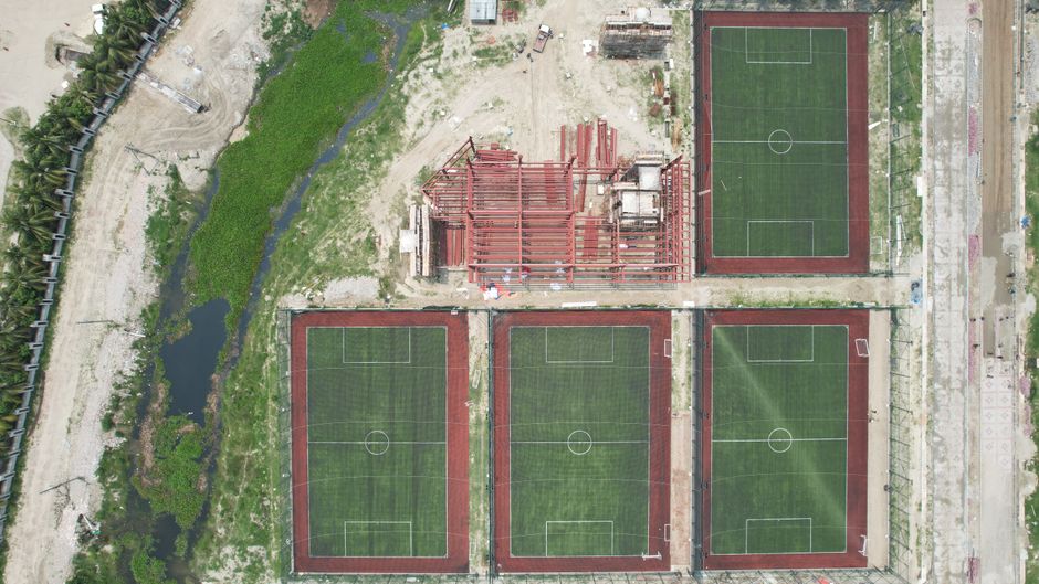 Construction equipment at a large athletic fields development site