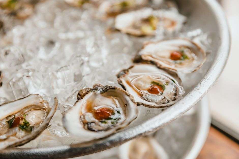 Fresh raw oysters served on a bed of crushed ice