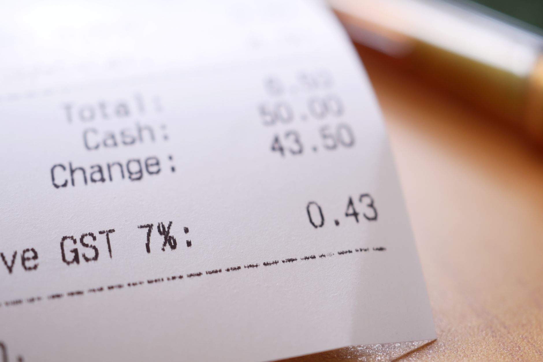 Retail checkout counter with a cash register
