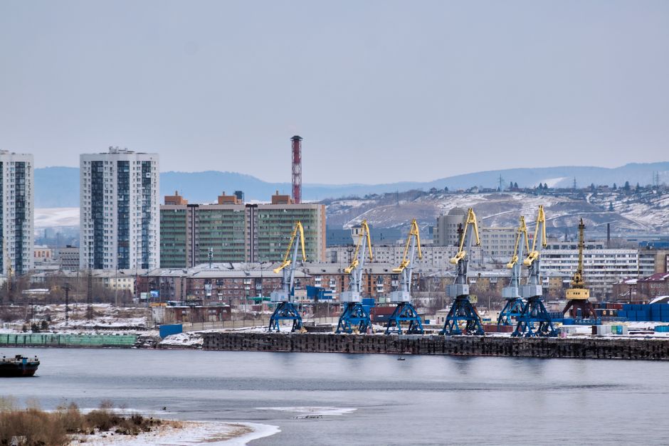 River waterfront with industrial facilities in the background