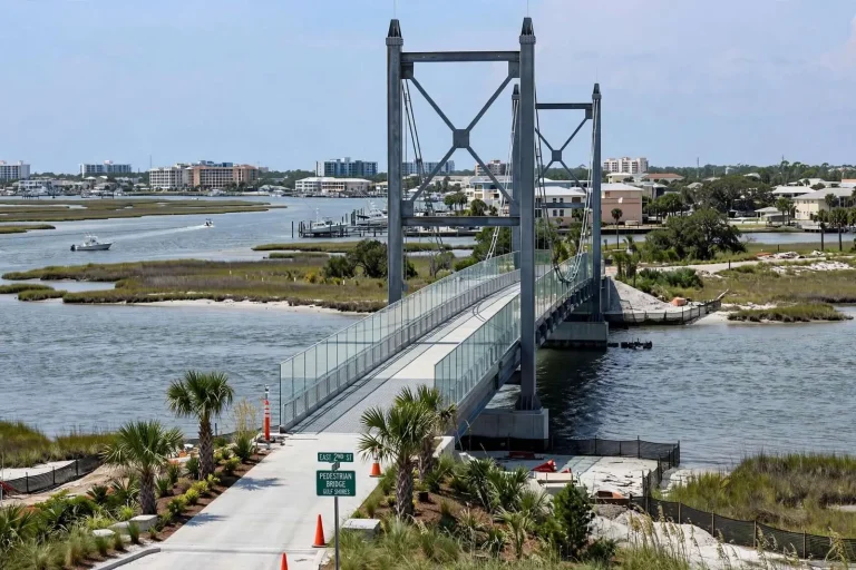 Illustration for the news story: Gulf Shores Council Reviews Bridge Cost Overruns, Taxi Permit and Staffing Changes