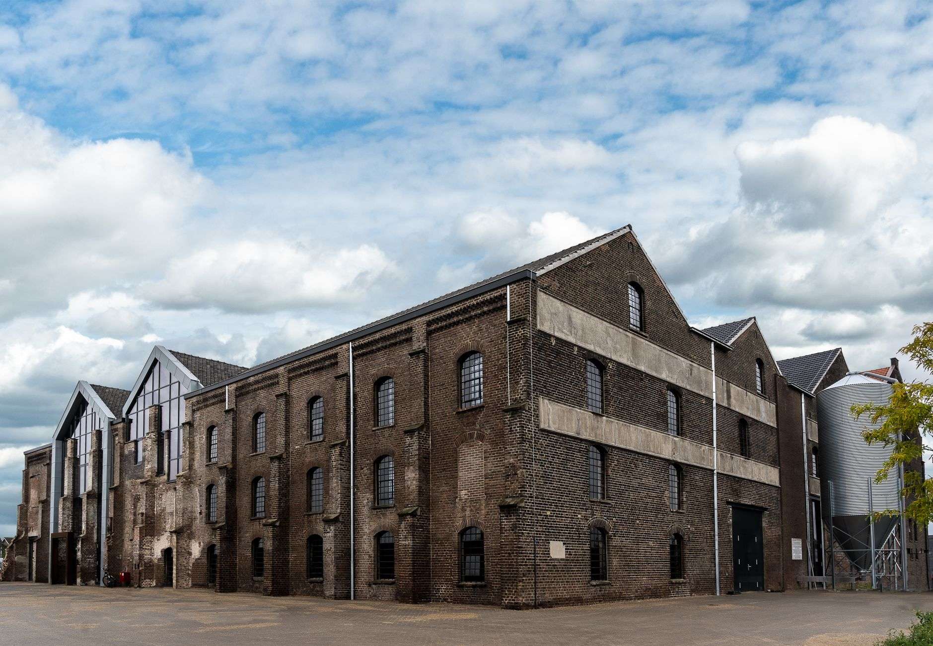 A century-old brick warehouse building similar to Mobile's historic Crystal Ice Company property