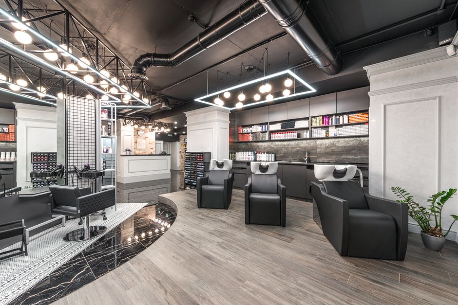 Salon interior featuring styling chairs and mirrors