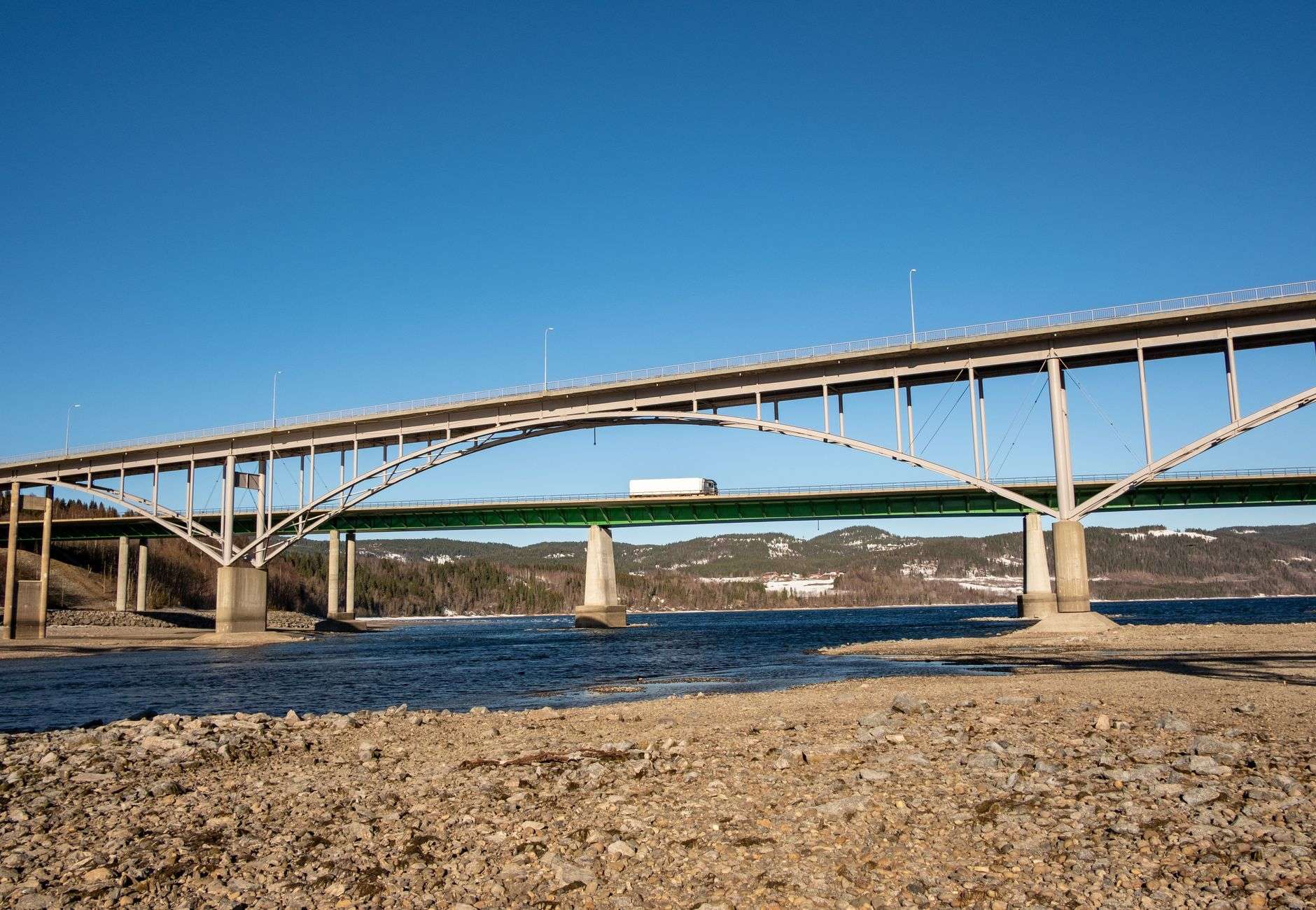 A modern highway bridge spanning a river, similar to the proposed I-10 Mobile River Bridge