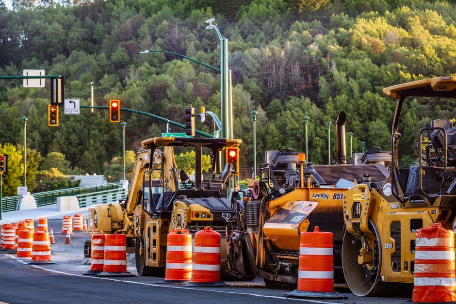 Road construction on a highway with orange cones