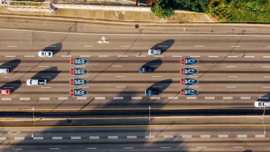 An interstate highway lane with traffic, similar to the scene of a lane closure